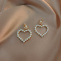 Fashionable And Personalized Earrings Without Ear Holes, Retro Round Face, High-end Feeling, Imitation Pearl Heart Earrings